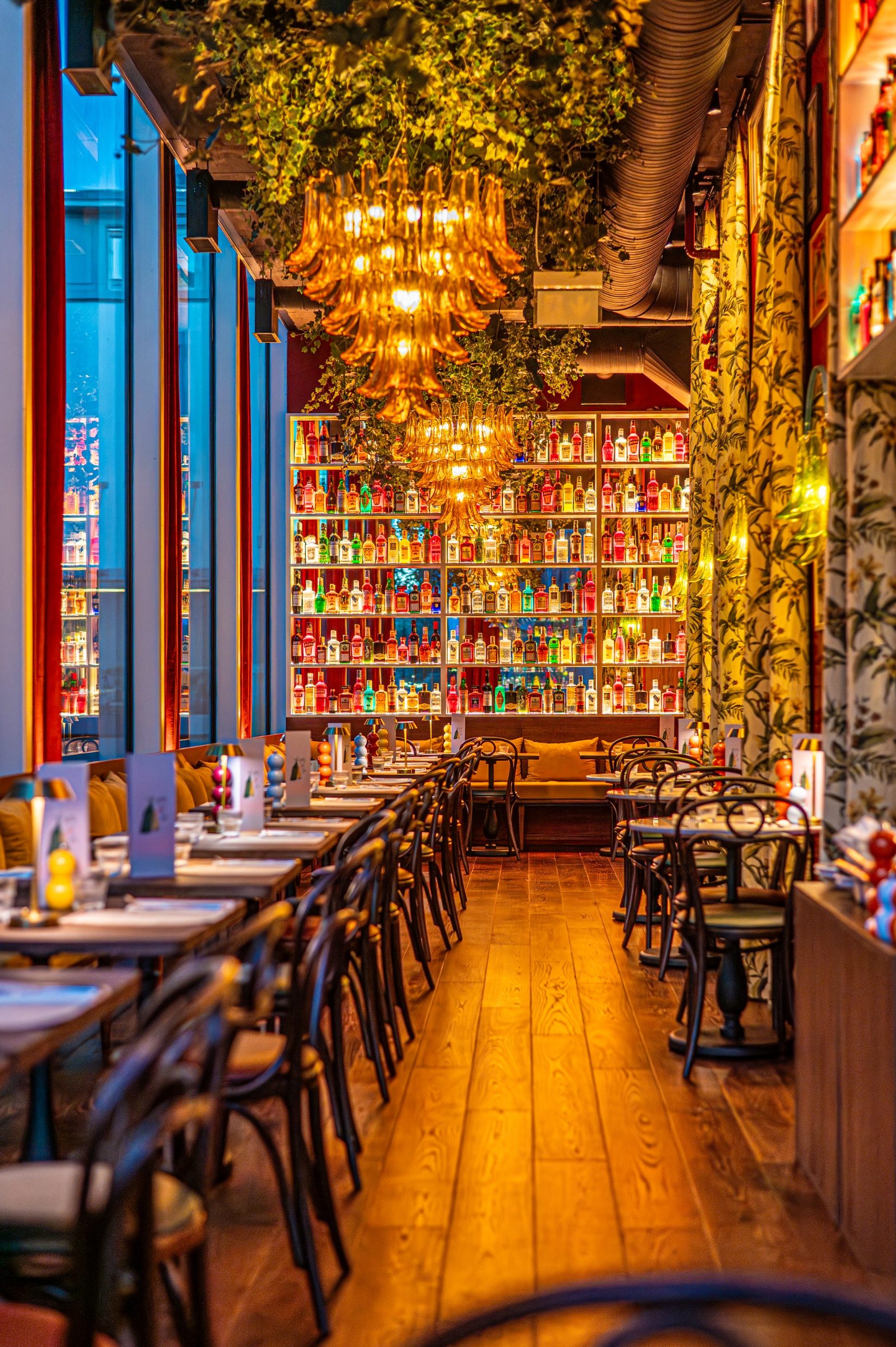 The dining room at Gran Torino with its tables, chairs and long bar